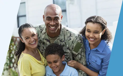 Veteran smiling with family.